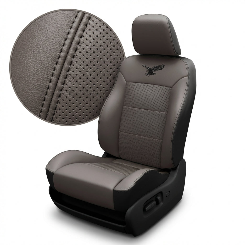 Gray car seat with detailed stitching and an eagle emblem on a white background