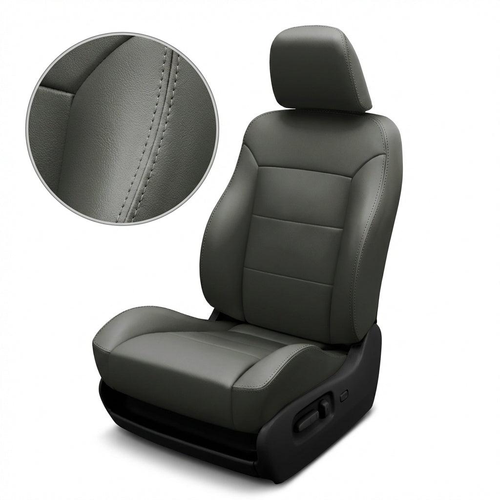 Gray car seat with detailed stitching on a white background