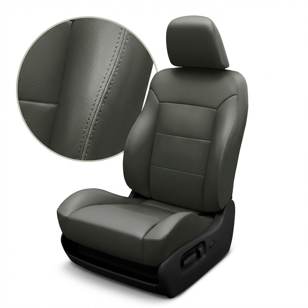 Gray car seat with detailed stitching on a white background