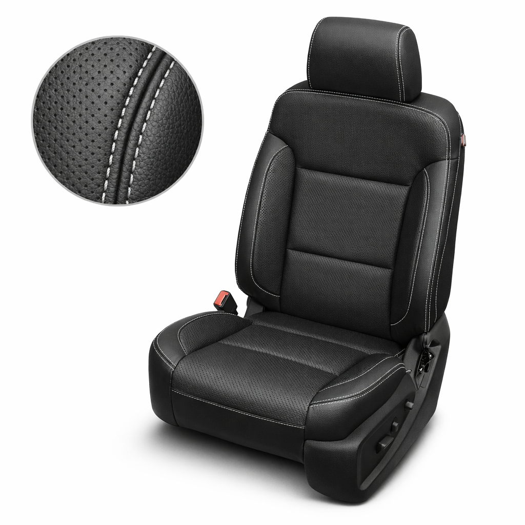Close-up product image of a 2014–2019 Chevrolet Silverado Old Body Style Leatherteck leather seat upholstery kit in black, featuring perforated inserts and silver contrast stitching. The seat is shown on a white background with a circular zoom inset highlighting the black leather grain, perforated insert texture, curved bolster seam, and silver double-stitched seam detail. The full seat displays a black headrest, perforated black seatback and cushion center panels, smooth black side bolsters, silver stitch