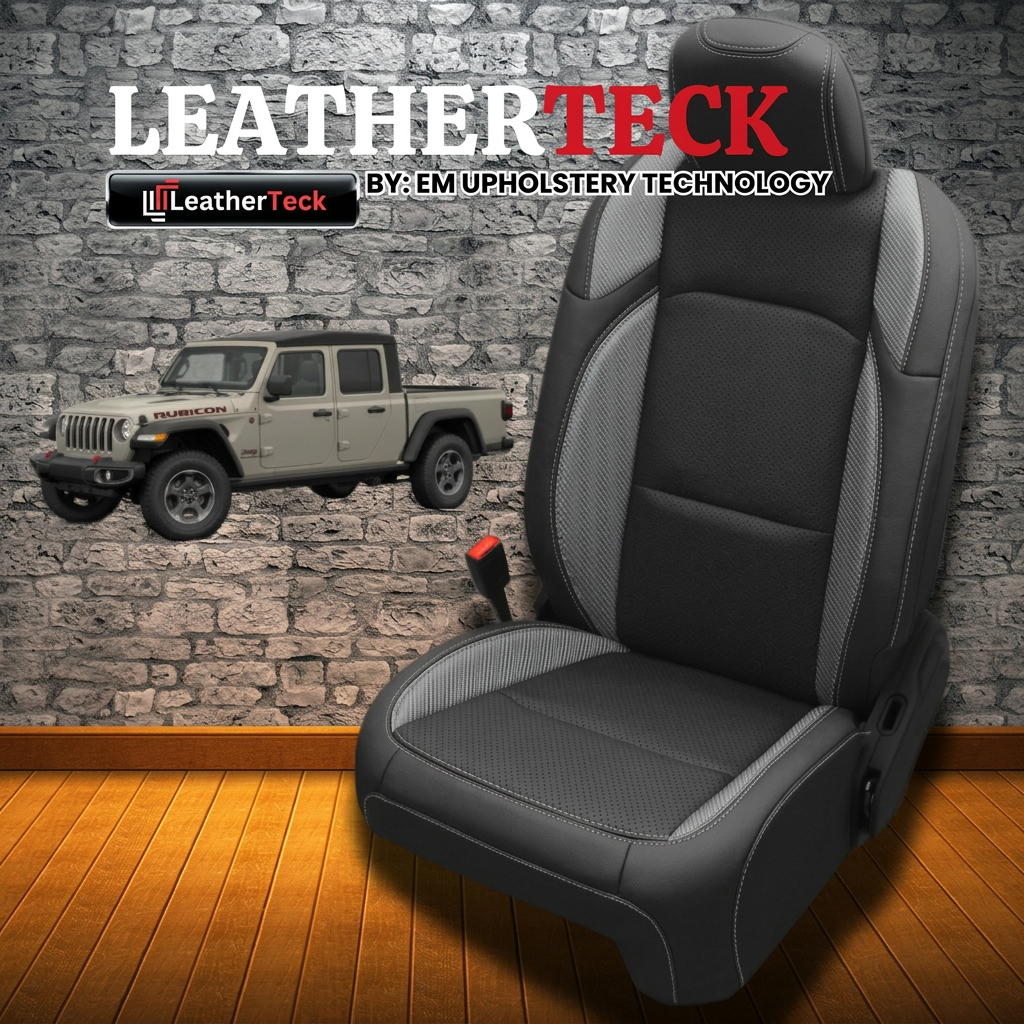 Leatherteck brand promo image for a 2020–2026 Jeep Gladiator featuring Leatherteck/Katzkin K1 (K2152-100) seat cover in black wrap with a perforated black center, carbon/nickel vinyl wing panels, and silver contrast stitching, with Leatherteck logos and a Gladiator truck graphic on a stone-wall/wood-floor background.