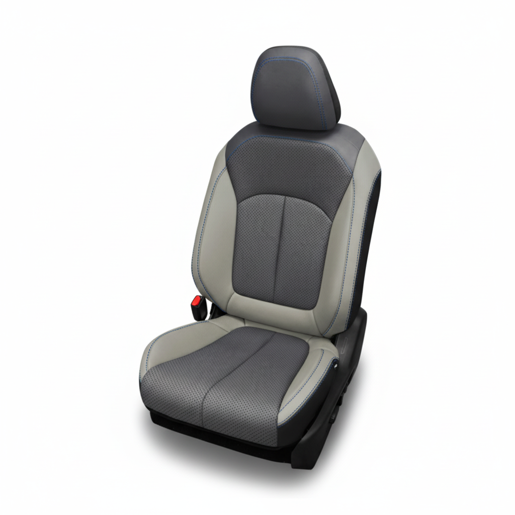 Two-tone leather car seat with perforated inserts and blue stitching on a white background.